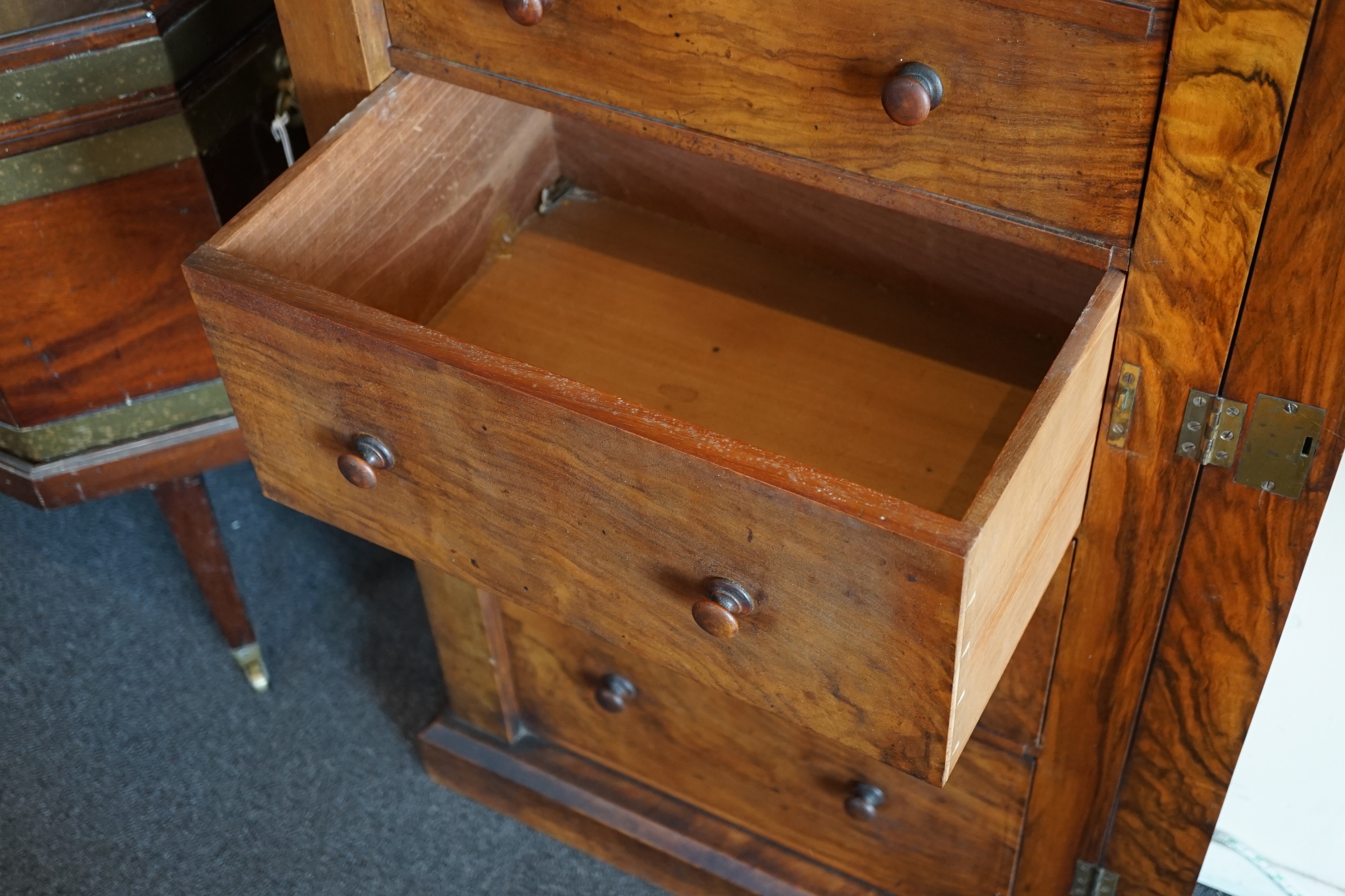 A Victorian figured walnut secretaire Wellington chest